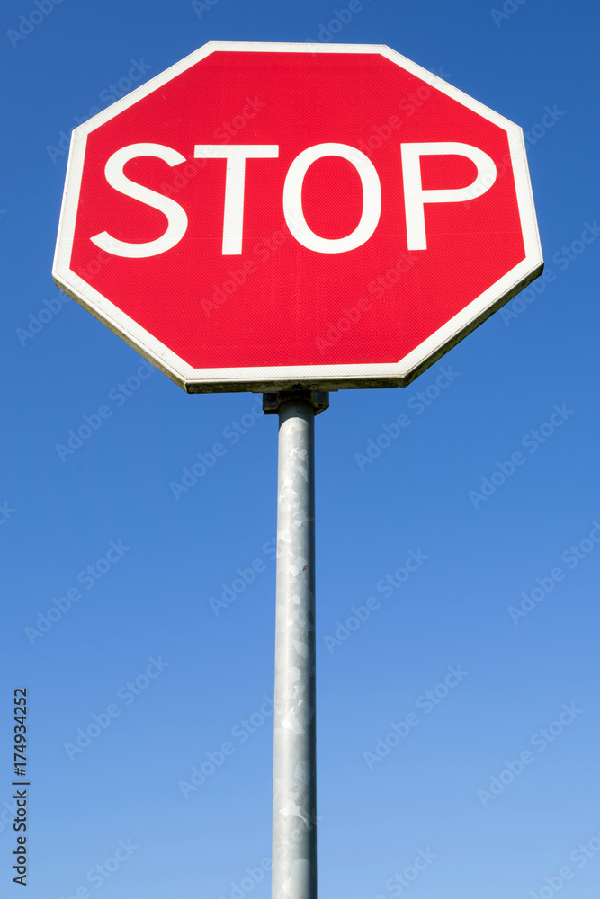 Dutch road sign: STOP, give priority to traffic on the main road ahead Dutch road sign: STOP, give priority to traffic on the main road ahead