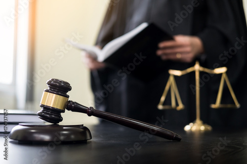gavel and soundblock of justice law and lawyer working on wooden desk background.
