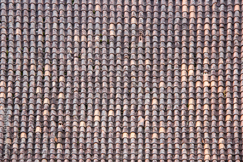 Antic Tile texture on the roof of an old Turaida castle in Latvia. Architecture background