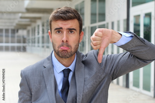 Rejected businessman whining in the office