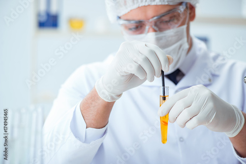 Doctor testing patients urine for medical purposes