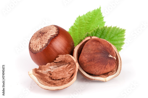 Hazelnuts with leaves isolated on white background