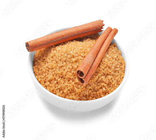 Fototapeta Naklejka Na Ścianę i Meble -  Sweet cinnamon sugar in bowl on white background