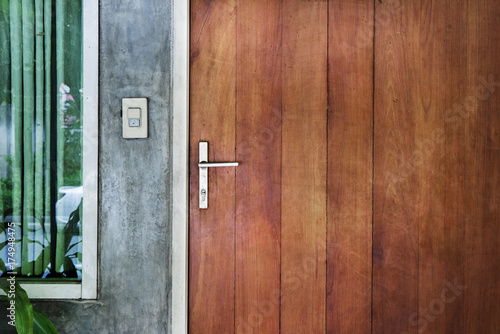 steel handle wood door in the city