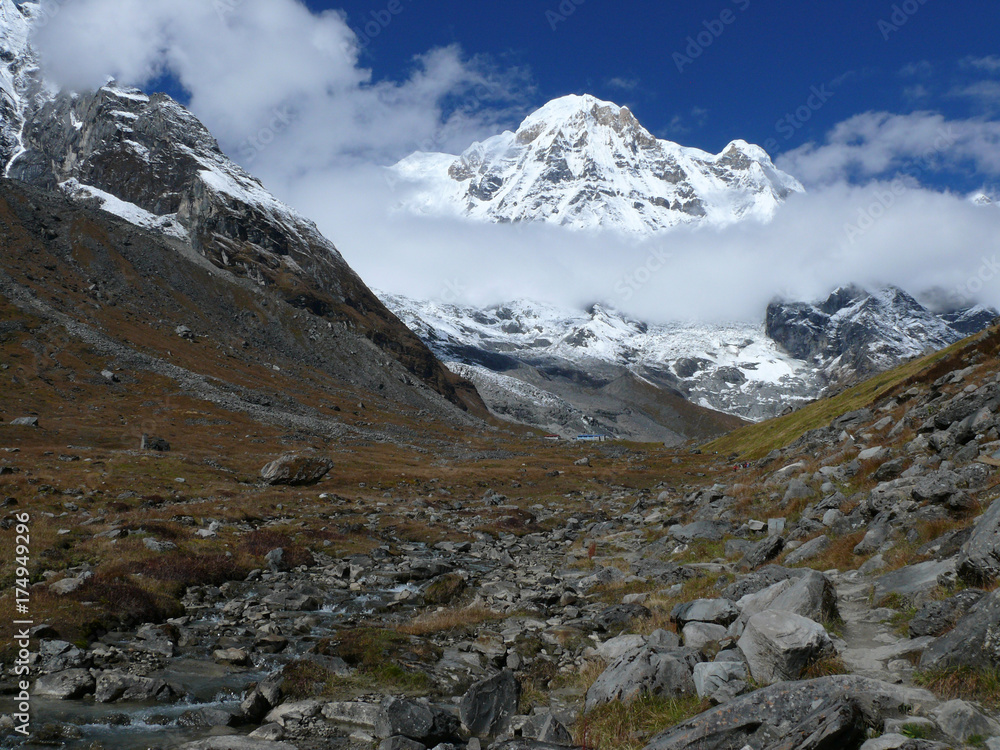 Annapurna Base camp, Annapurna Circuit trek in Nepal, snow capped Himalayas and mountain stream Annapurna Base camp, Annapurna Circuit trek in Nepal, snow capped Himalayas and mountain stream