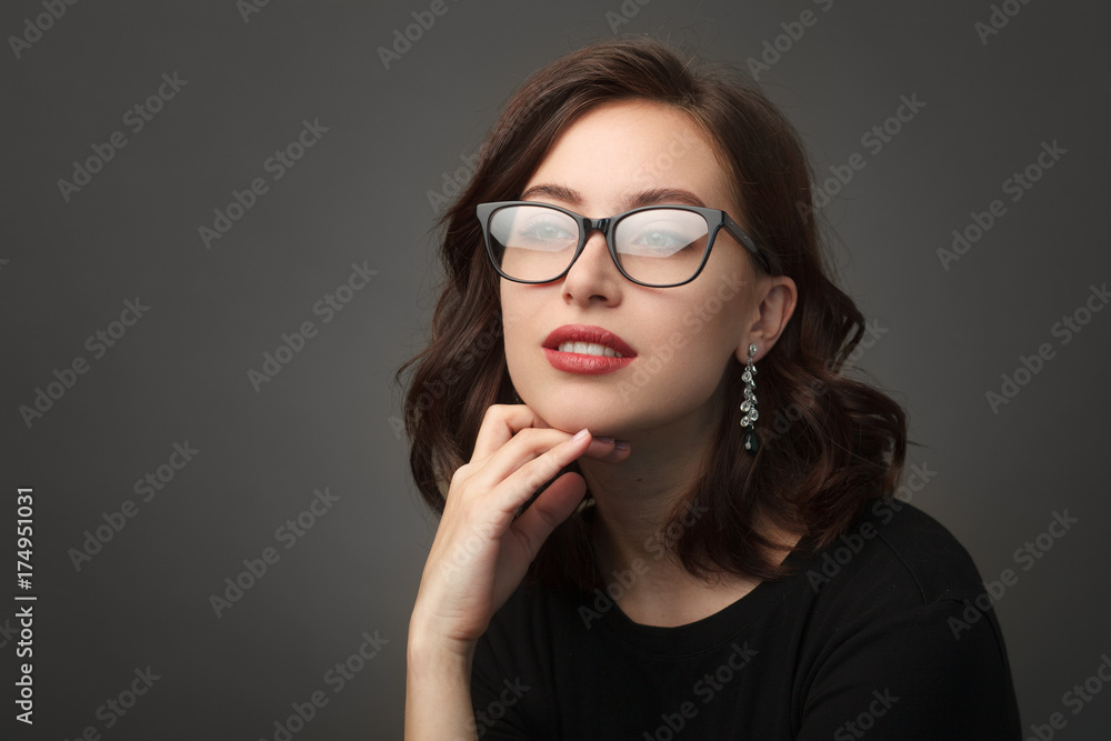 Beautiful woman in black rimmed glasses Beautiful woman in black rimmed glasses