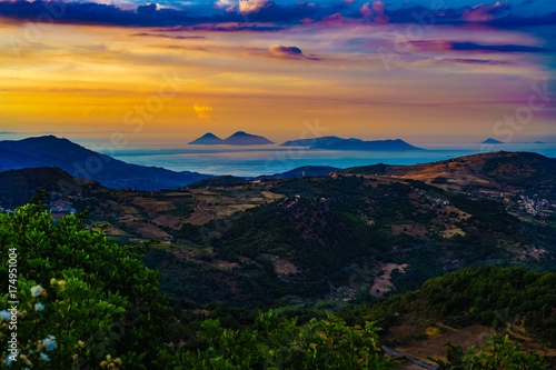 Beautiful sunset from Montalbano Elicona, view of Aeolian Islands, Sicily Italy. photo