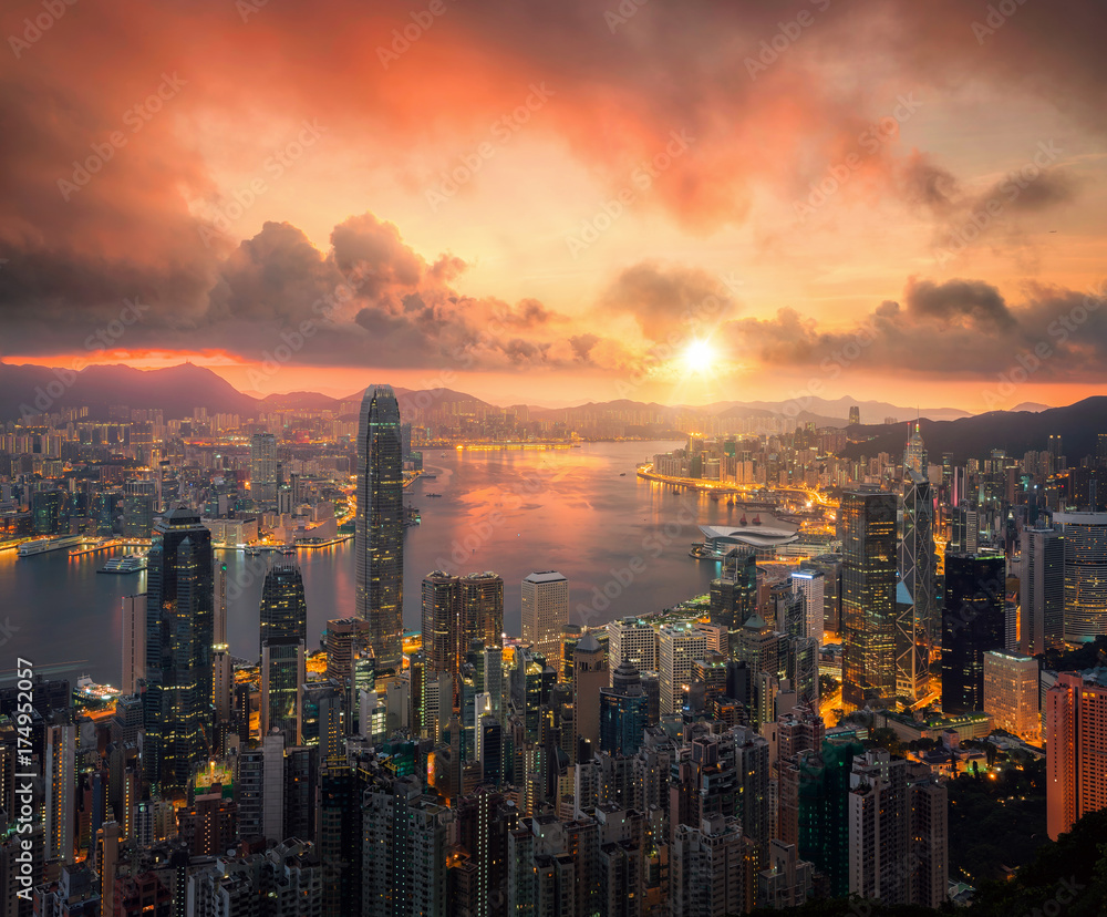 Fototapeta premium Hongkong city scape with sun and light from building