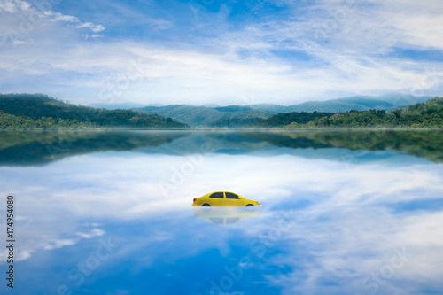 Yellow car in the lake.