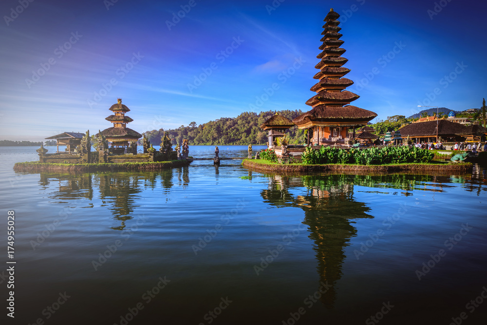 Fototapeta premium Pura Ulun Danu Bratan, Hindu temple on Bratan lake landscape at sunrise in Bali, Indonesia.