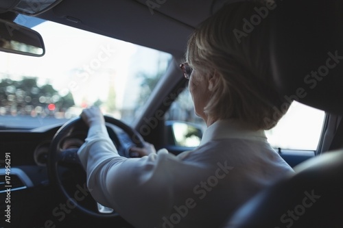 Rear view of businesswoman driving © wavebreak3