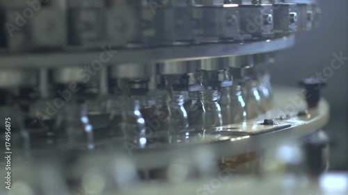 Factory. Juice production. Conveyor of bottle photo