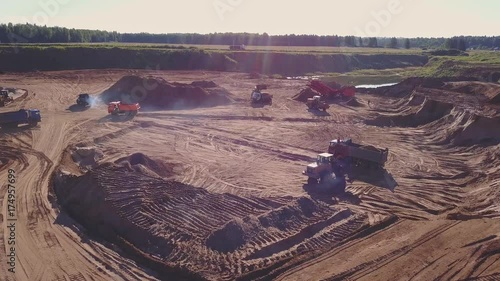 Aerial view of loading sand into trucks
