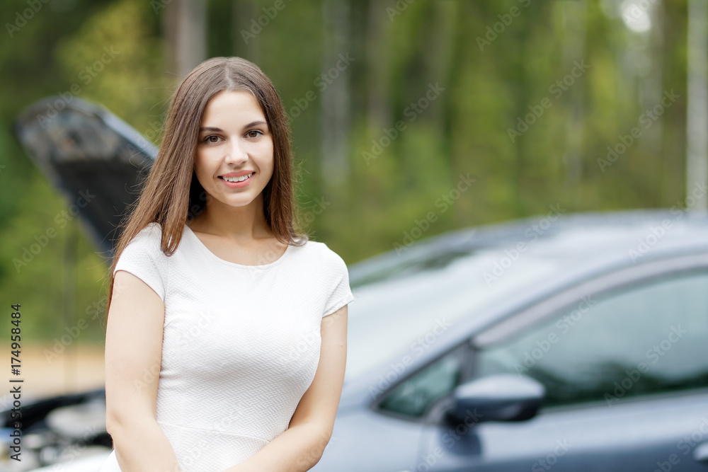 portrait of a girl near a broken car portrait of a girl near a broken car