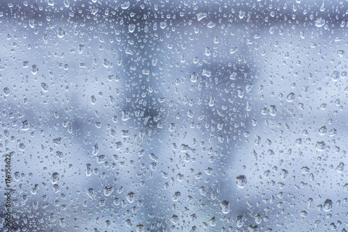 rainy days ,rain drops on windows surface © babaroga