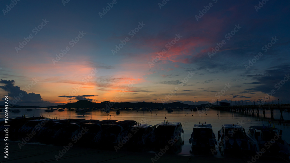 speed boats in the sea beautiful sunrise at phuket thailand. speed boats in the sea beautiful sunrise at phuket thailand.