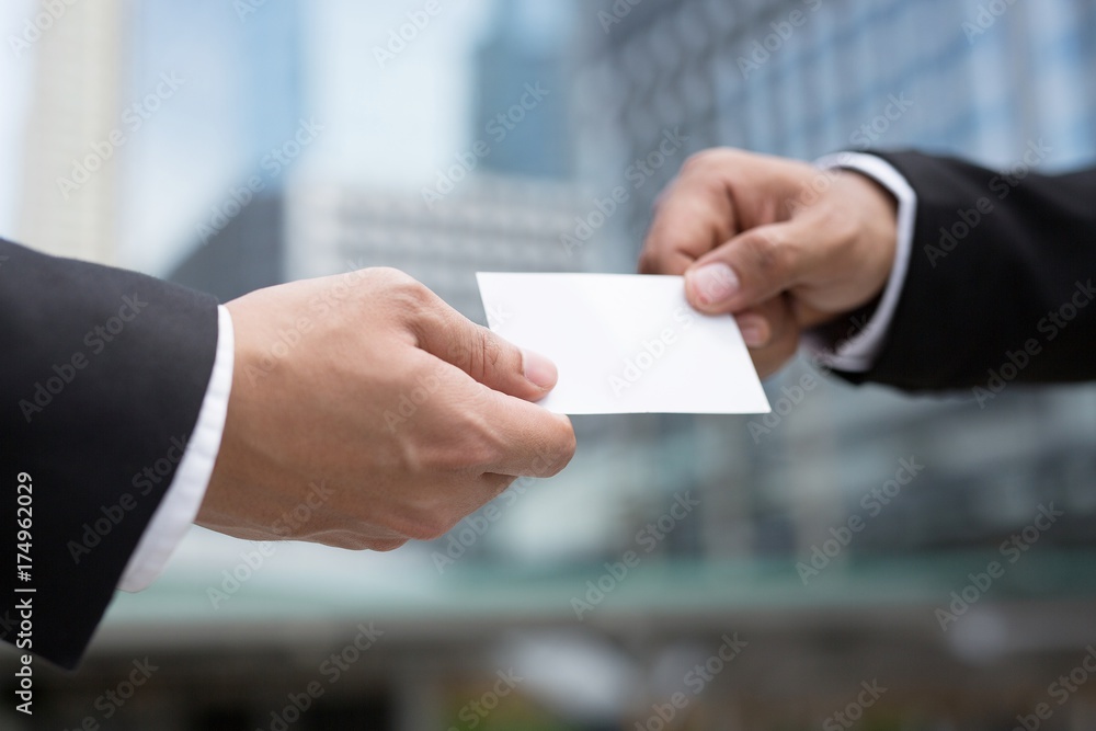 business man in hand hold show business cards blank white card mock up filing give to connect business contacts. Business branding concept. business man in hand hold show business cards blank white card mock up filing give to connect business contacts. Business branding concept.
