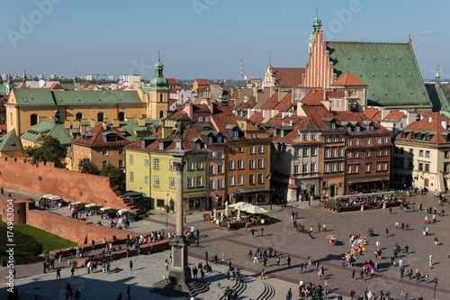 Colorful houses, Barbican, Royal Castle and King Sigismund Column at the Castle Square in the Warsaw Old Town, placed on the list of UNESCO World Heritage Site, on a beautiful sunny day, Poland