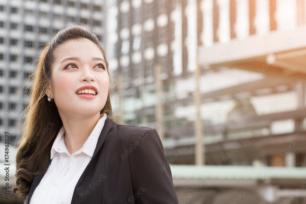 Business woman happy smile on something imaginary look to success. concept working woman. Business woman happy smile on something imaginary look to success. concept working woman.