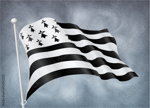 Breton flag on wind with rainy sky background