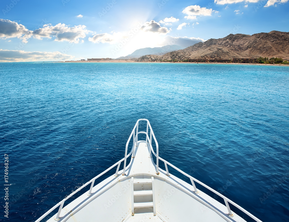 Motor yacht in a bay
