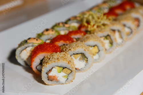 A colourful sushi set. Selective focus. Small depth of field.