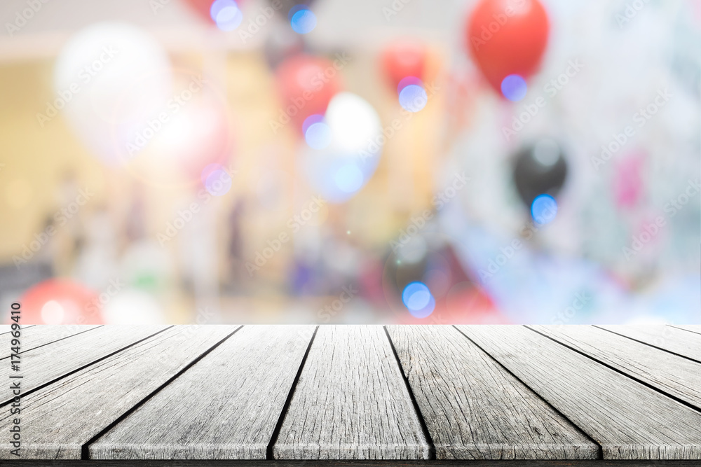 Empty wooden table with party in wedding background blurred. Empty wooden table with party in wedding background blurred.