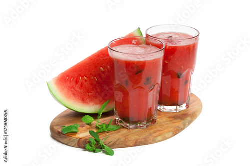 Watermelon drink in glasses with slice