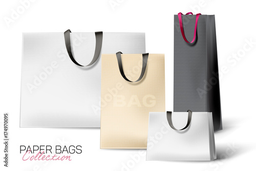 Set of beautiful, realistic shopping bags. Paper texture and silk handles. Different size and colors bags