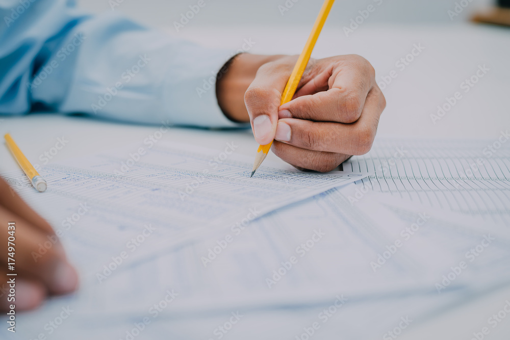 Image of financial worker analyzing statistical data,Financial business concept Image of financial worker analyzing statistical data,Financial business concept