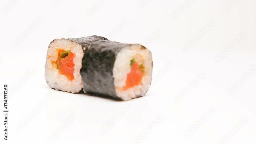 sushi rolls rotating on white presentation sushi rolls rotating on white presentation
