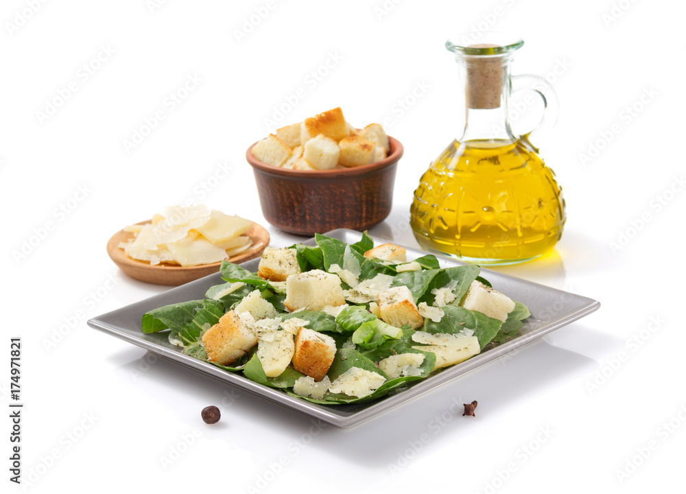 caesar salad in plate on white background caesar salad in plate on white background