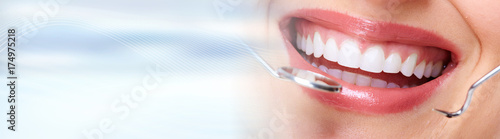 Fotografie, Tablou Woman teeth with dental instruments