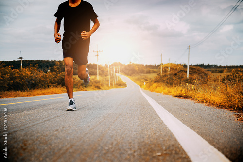 The man with runner on the street be running for exercise.Run for health concept.