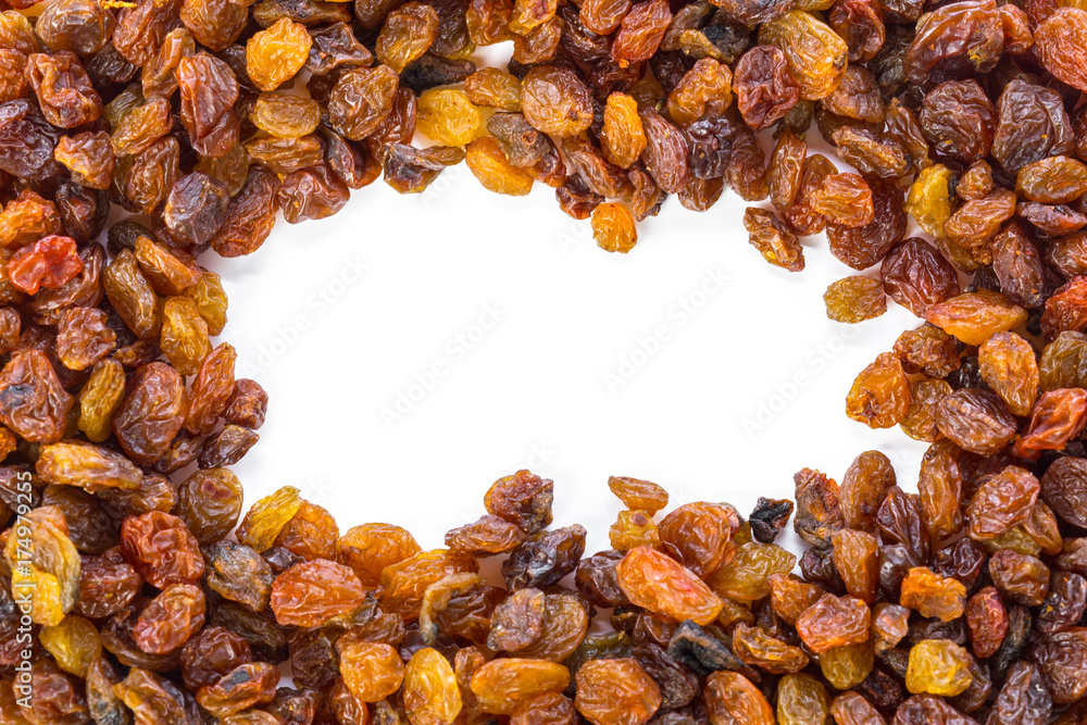 Obraz premium Dried raisins on a white background