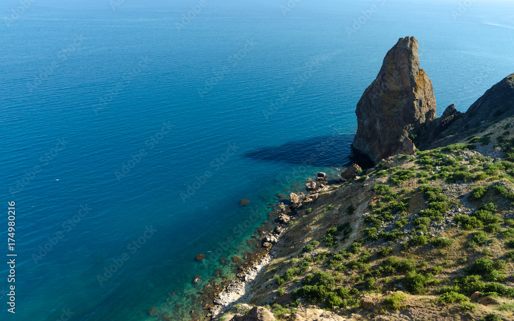 Fiolent Cape Crimea Black Sea. Blue azure seaside with corals sand and stones Fiolent Cape Crimea Black Sea. Blue azure seaside with corals sand and stones
