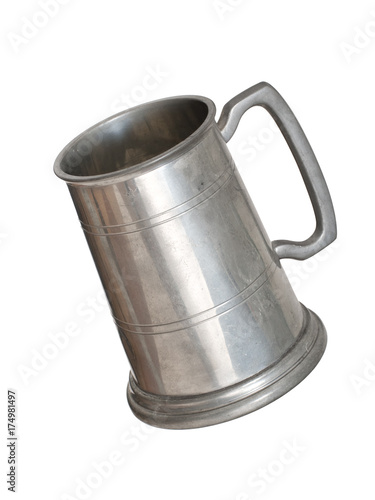 Vintage pewter tankard isolated on white.