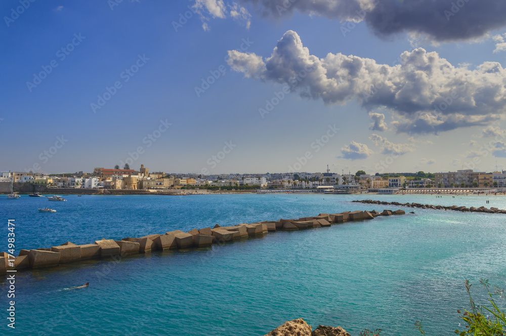 The most beautiful villages in italy: Otranto.Salento coast: panoramic wiev of the port, the old town the sandy beach. Italy (Apulia).