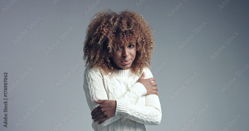Pretty black girl with big hair posing video. feel freeze. cold season concept Pretty black girl with big hair posing video. feel freeze. cold season concept