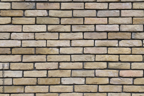 yellow cracked brickwork