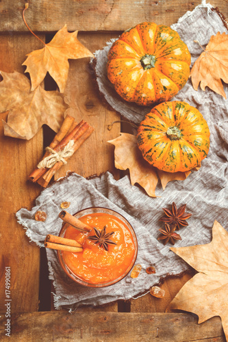 Fall autumn pumpkin jam confiture with spices, toned