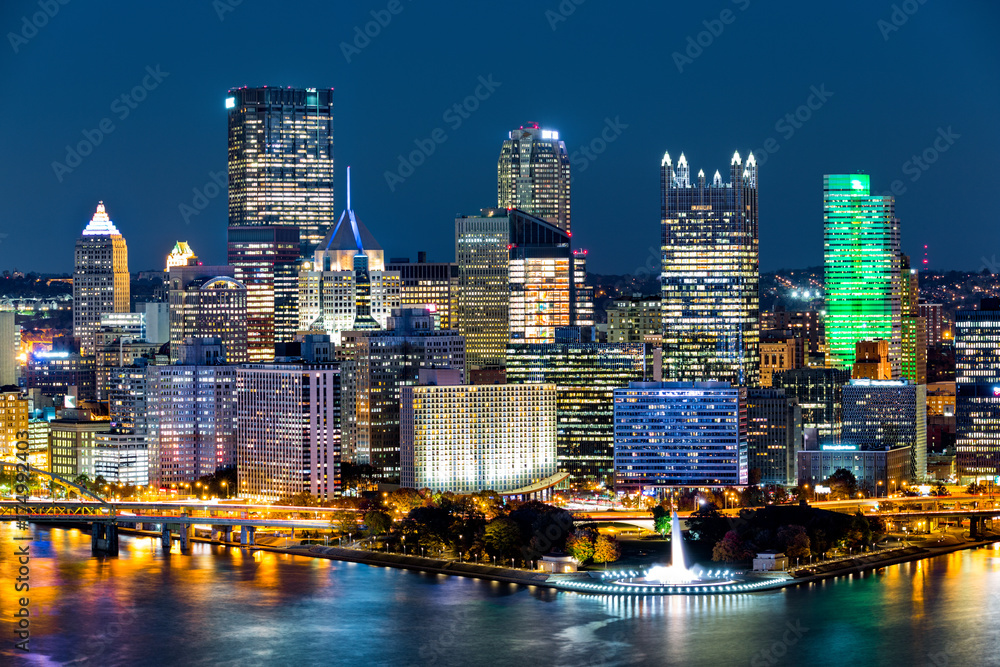 Pittsburgh downtown skyline by night. Located at the confluence of the Allegheny, Monongahela and Ohio rivers, Pittsburgh is also known as 