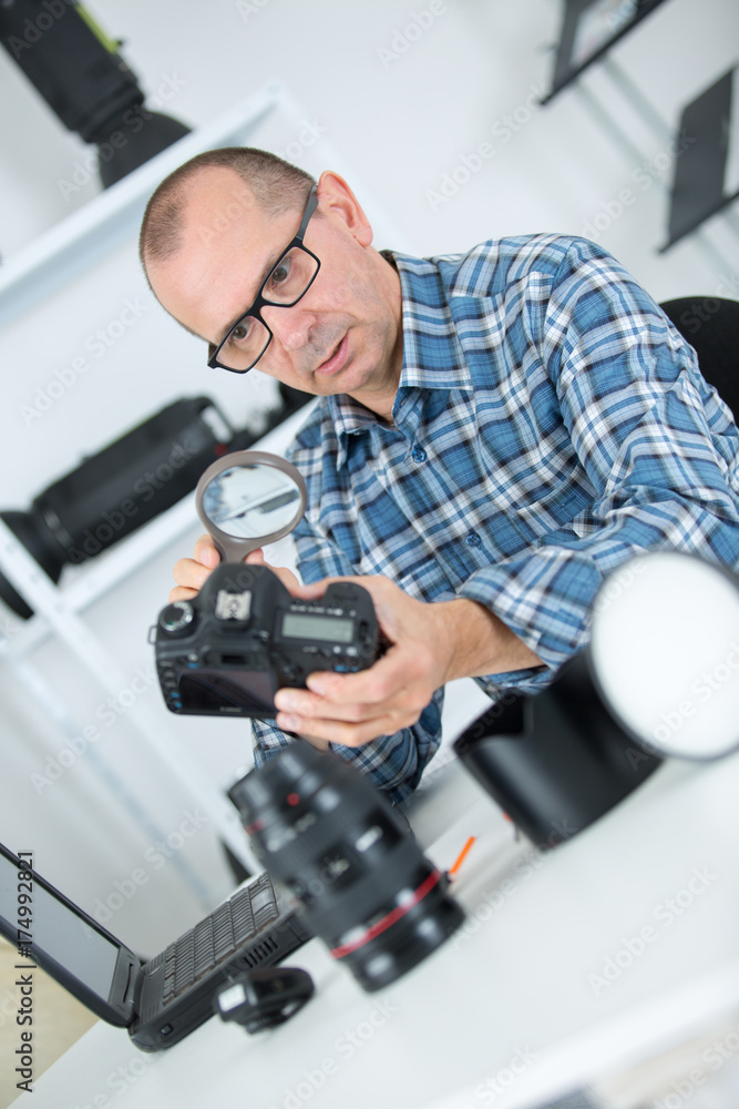 man with magnifier man with magnifier