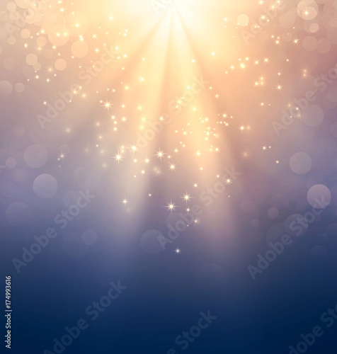 Holy light down ray, sparkling gold glitter, festive Christmas Birthday New Year background photo