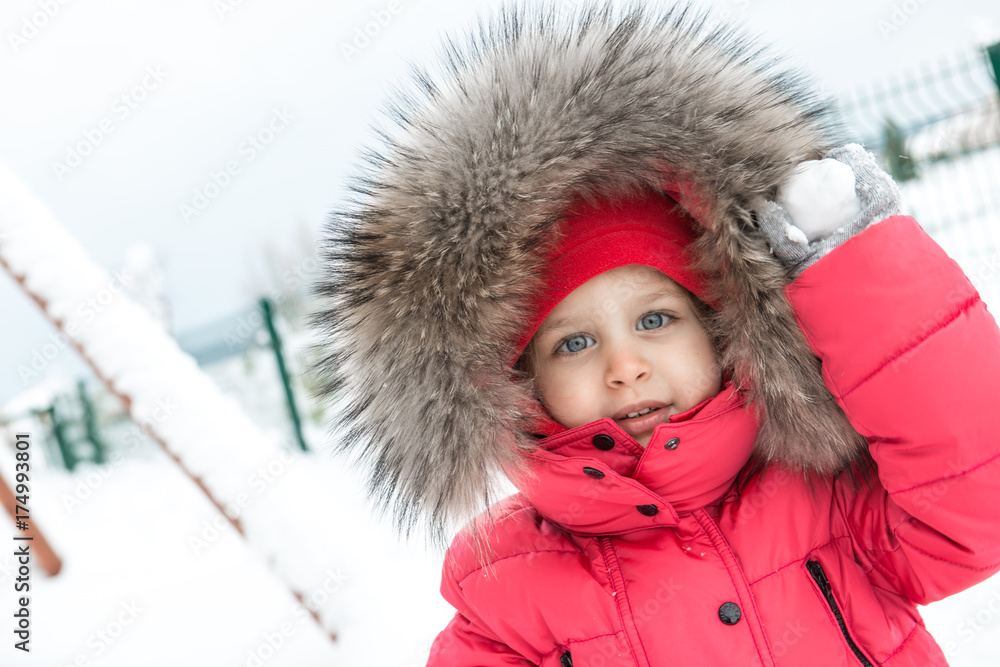 cute girl is playing with snow cute girl is playing with snow
