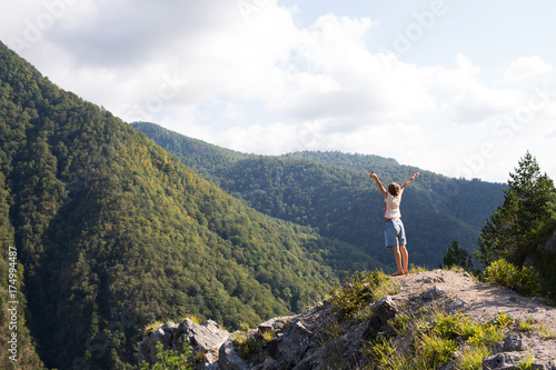 A woman admires of the mountains