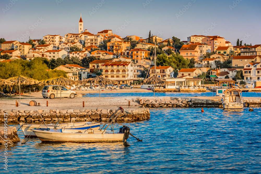 Fototapeta premium Seget Vranjica coastal view. / Seafront view at small town in suburb od Trogir, Beget Vranjica scenery, Croatia.