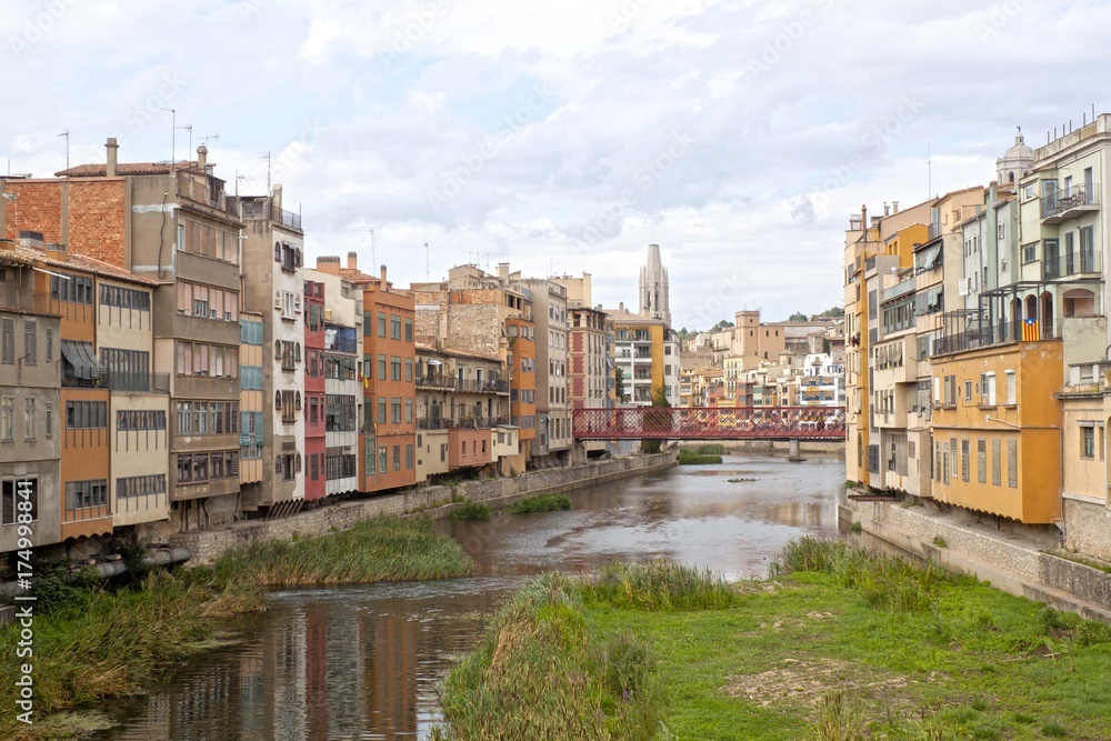 Oñar river passing by Gerona and a bridge, Spain