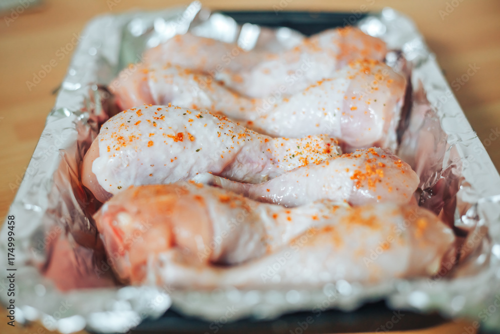 Baking sheet with chicken legs Baking sheet with chicken legs