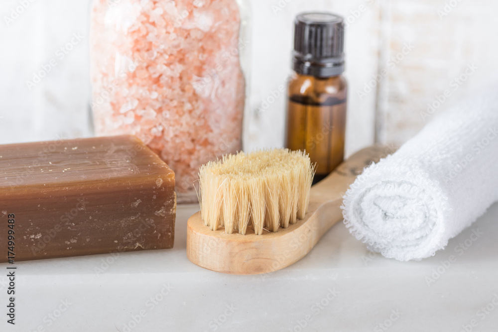 Handmade Coal Tar Soap Pink Himalayan Salt Essential Oil Towel Brush on White Marble Background. Spa Wellness Relaxation Body Care Skincare Concept. Natural Products Handmade Coal Tar Soap Pink Himalayan Salt Essential Oil Towel Brush on White Marble Background. Spa Wellness Relaxation Body Care Skincare Concept. Natural Products